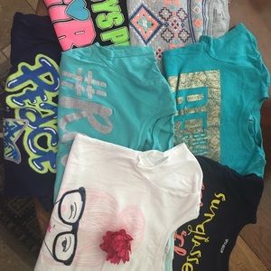Lot of 7 named brand girls short sleeve shirts.